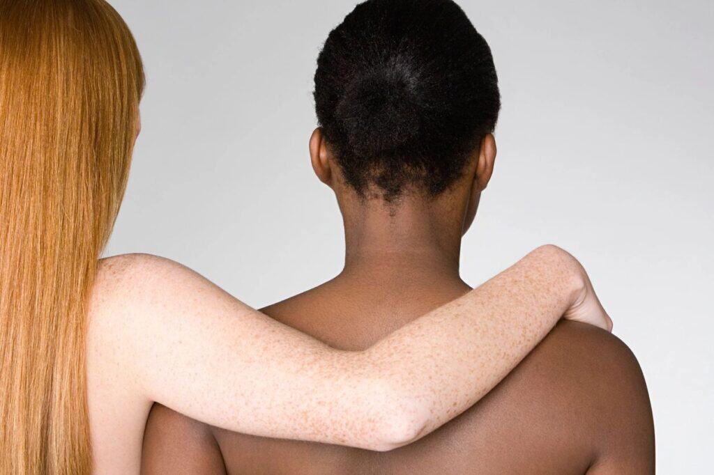 Navigating Menopausal Skin: Understanding the Changes and Supporting Your Skin's Health 1 two women standing together facing away